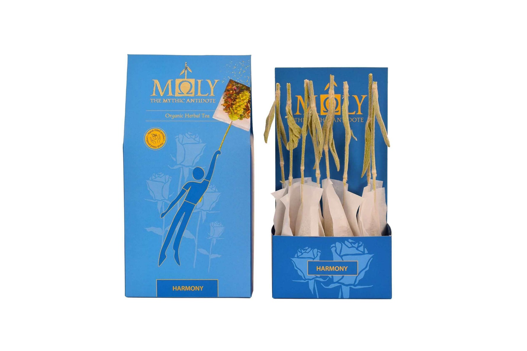 Eine blaue Verpackung des Moly Harmony Bio. Zentral ist Bild aufgedruckt, welches einen Teebeutel mit Inhalt zeigt aus dem der Stengel der Sideritis scardia (griechischer Bergtee) herausragt. Daneben ist der Inhalt der Verpackung zu sehen, der aus zehn einzelnen Teebeuteln mit jeweils einem Sideritis-Stengel besteht.